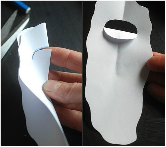 Fold the cut paper down to make a gap.