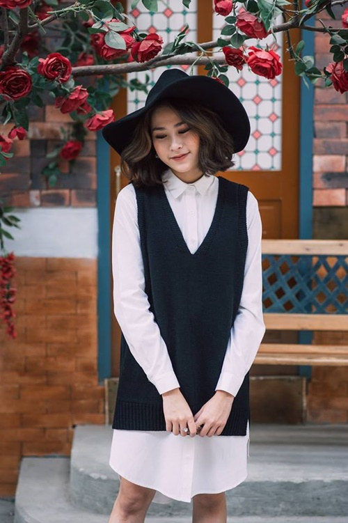 Các cô nàng công sở có thể tận dụng chiếc sơ mi trắng của mình với chiếc áo len ba lỗ Các cô nàng công sở có thể tận dụng chiếc sơ mi trắng của mình với chiếc áo len ba lỗ