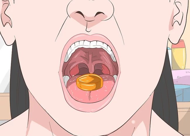 Uống thuốc xoa dịu cổ họng