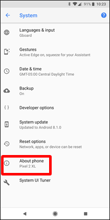 Vào phần About phone từ menu System/Hệ thống