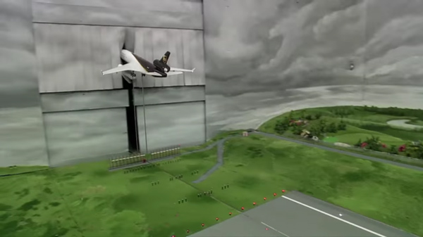 và biến mất sau một tấm rèm