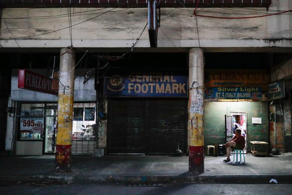 Các cửa hàng tại Manila, thủ đô Philippines, ngày 24/3