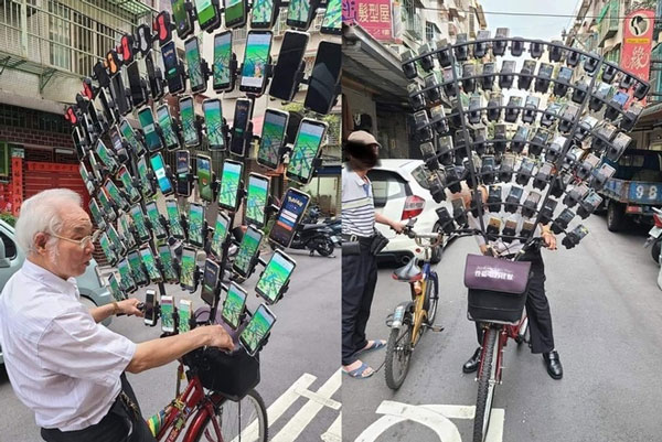 Ông Chen San-yuan với 64 chiếc smartphone để "săn thú". Ảnh: Yanwu.