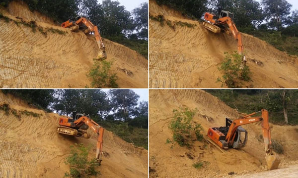 Máy xúc đổ đèo