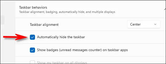 Bật tùy chọn “Automatically Hide the Taskbar”
