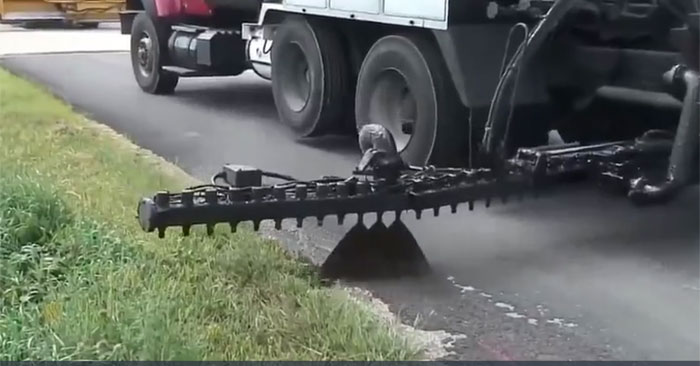 Cỗ máy phun nhựa đường