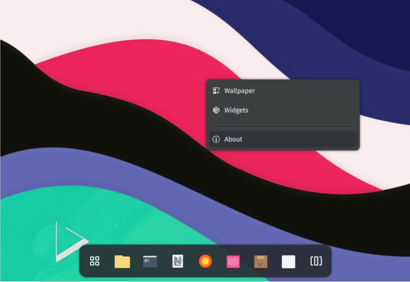 Môi trường desktop Nitrux OS với thanh menu ở dưới cùng