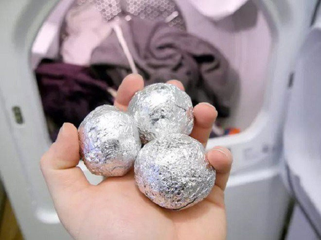 Putting silver paper into the washing machine, dryer