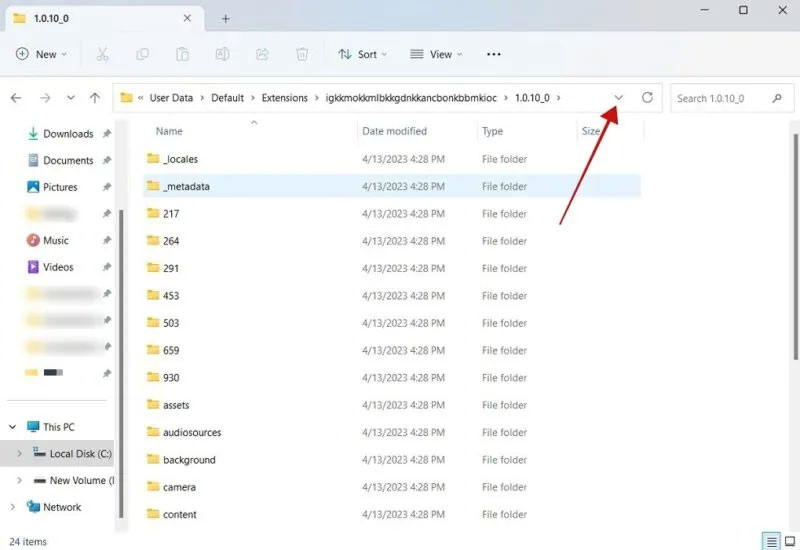 Nhấn biểu tượng mũi tên xuống để hiển thị đường dẫn thư mục trong File Explorer.