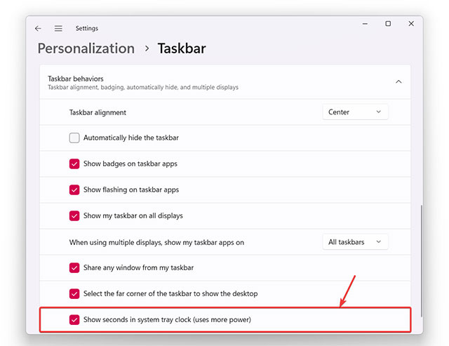 Bật "Show seconds in system tray clock"