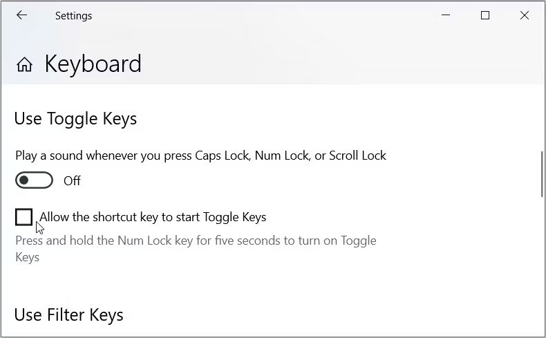 Bỏ chọn hộp Allow the shortcut key to start Toggle Keys
