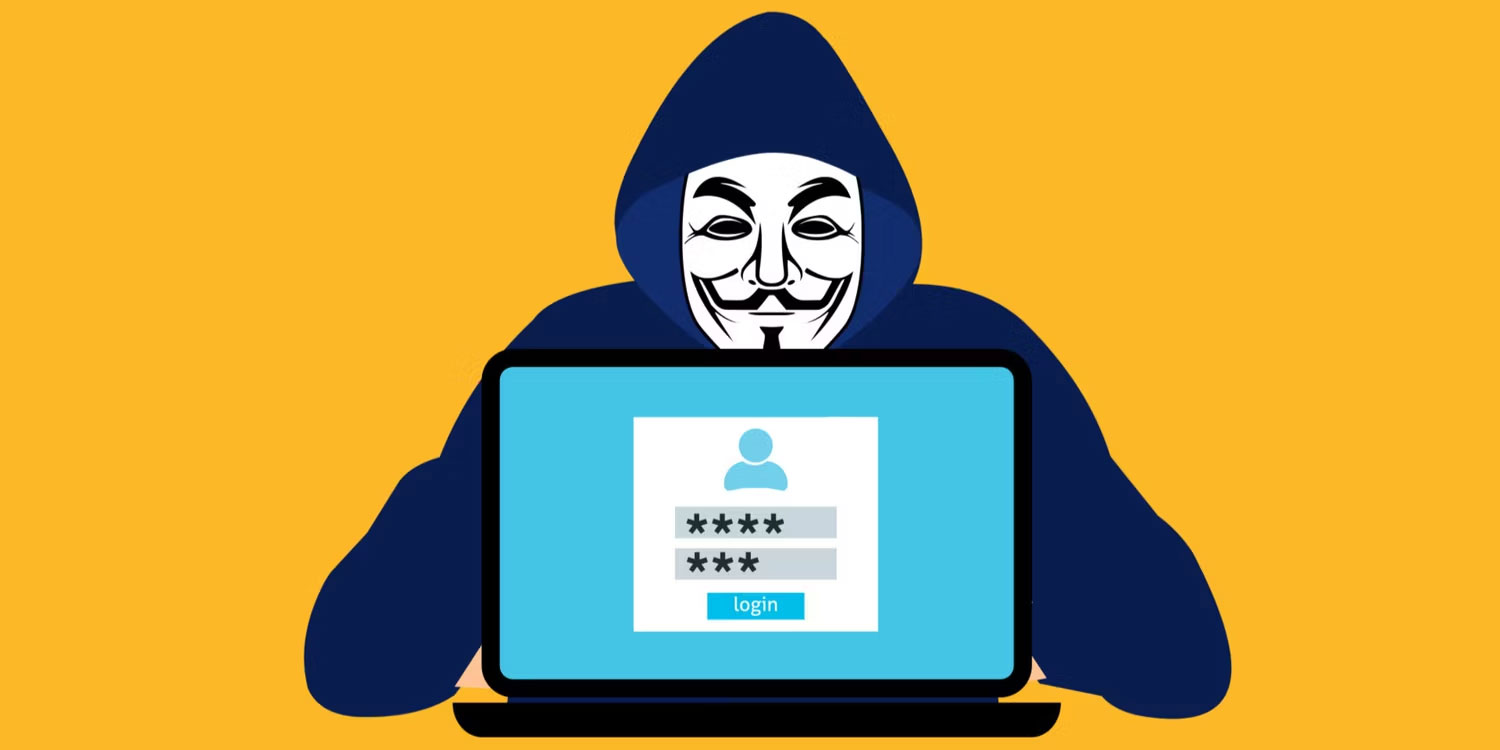 Cửa sổ đăng nhập trên laptop và hacker đằng sau laptop