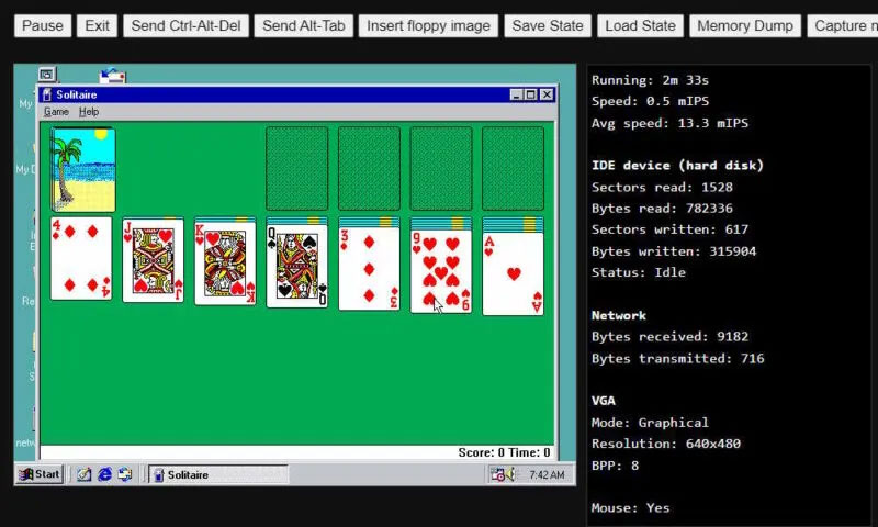 Windows 98 desktop opened in a browser emulator displaying the game Solitaire.