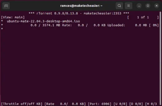 Terminal hiển thị rTorrent đang tích cực tải torrent Ubuntu MATE LTS.