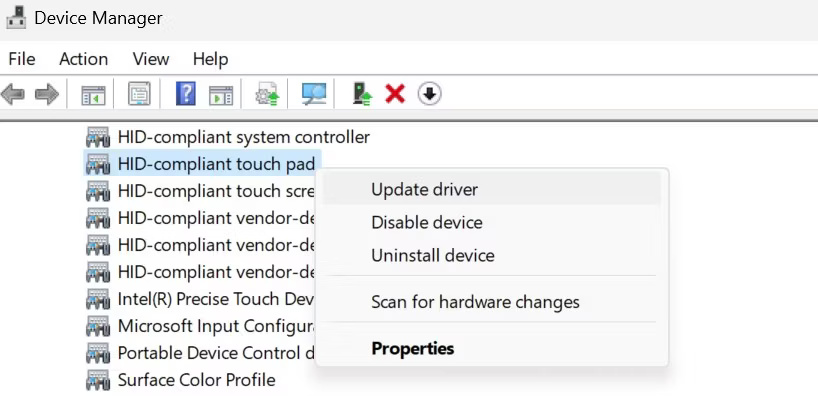 Cập nhật driver HID-Compliant Touchpad trong Task Manager Windows.