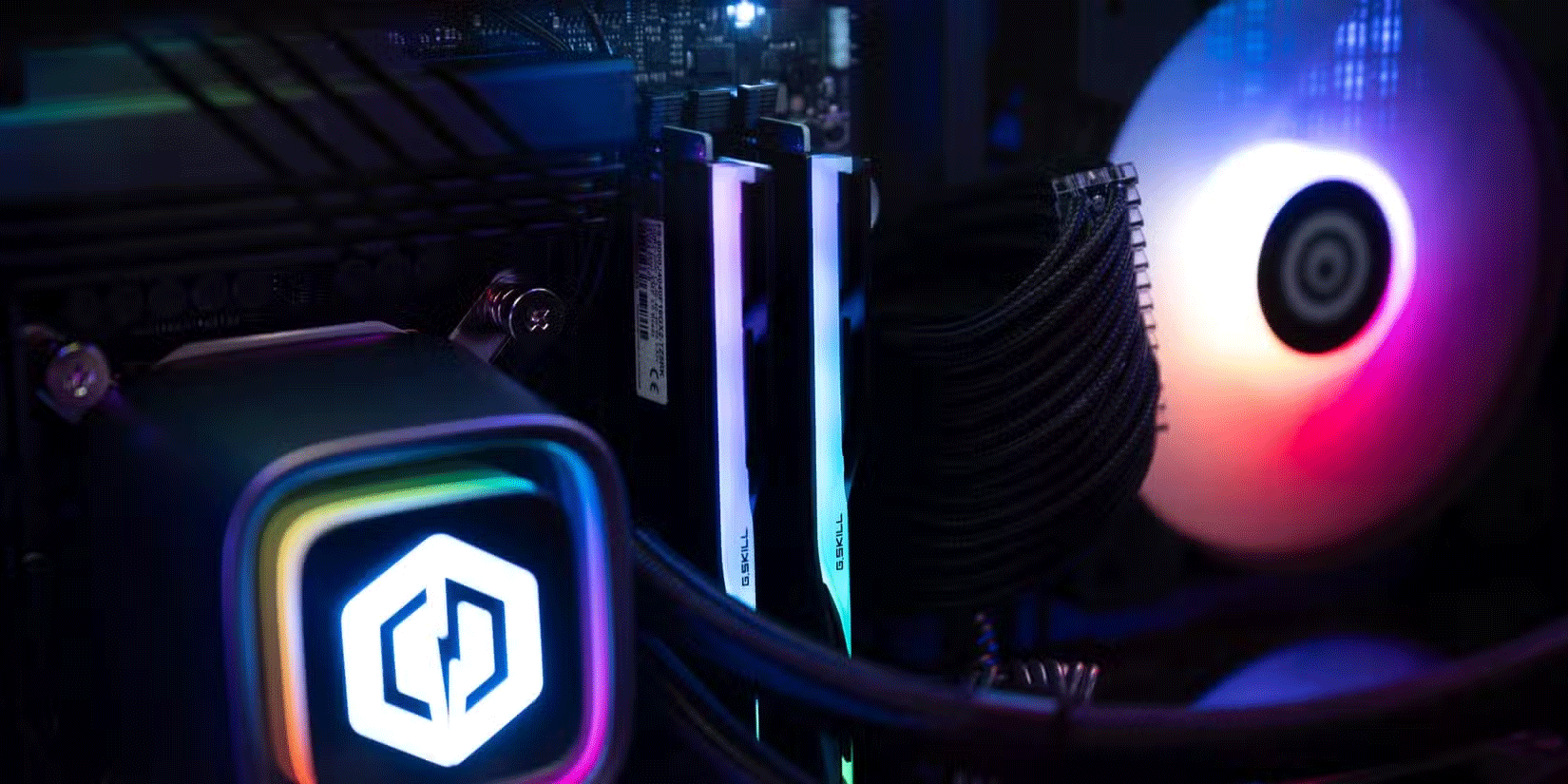 RGB PC fan, CPU cooler and RAM inside gaming computer