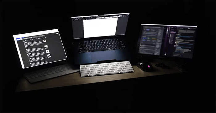 MacBook Air with multi-screen mobile setup