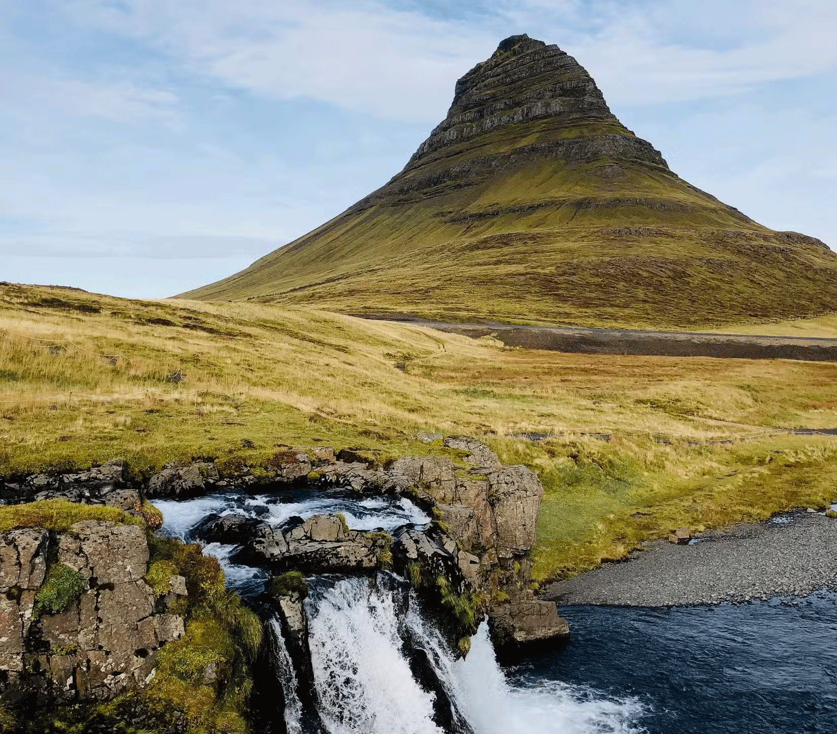 Photo of a mountain and waterfall taken in 1x zoom mode on a smartphone