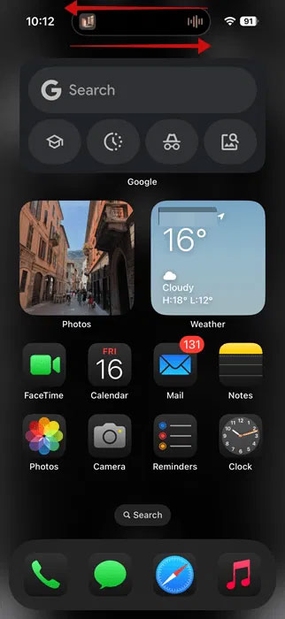 Vuốt trên Dynamic Island để ẩn hoặc hiển thị lại trên màn hình iPhone.