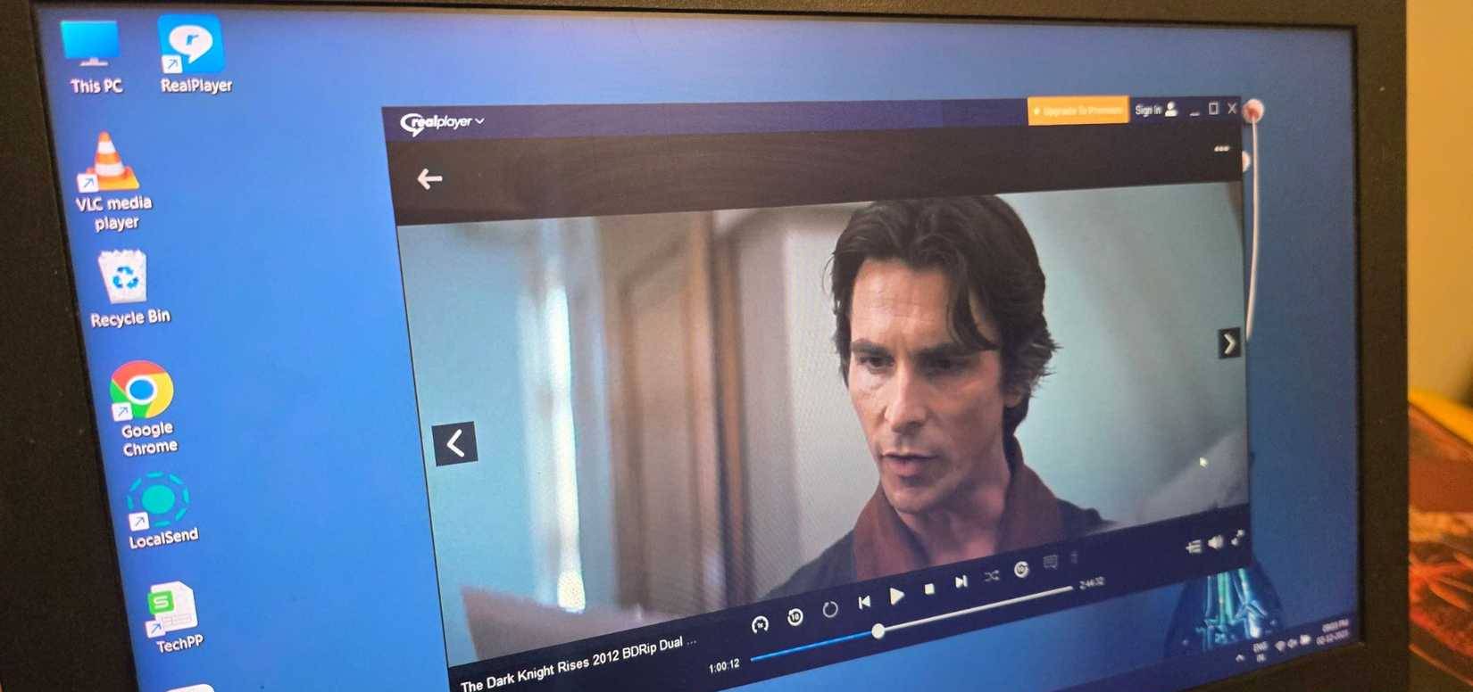 RealPlayer đang phát phim The Dark Knight Rises trên laptop Windows