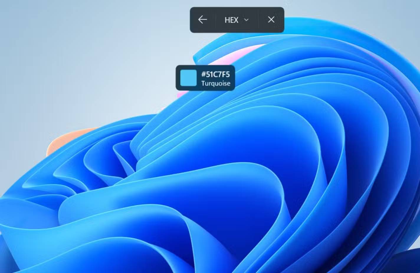 Công cụ chọn màu của Snipping Tool xác định sắc thái màu xanh ngọc với mã hex 51C7F5 trên desktop